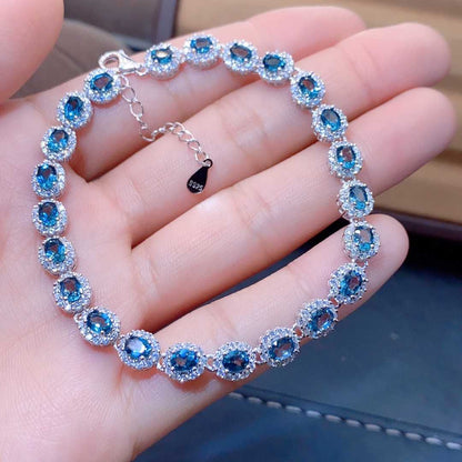 Blue Topaz Halo Tennis Bracelet | Sterling Silver