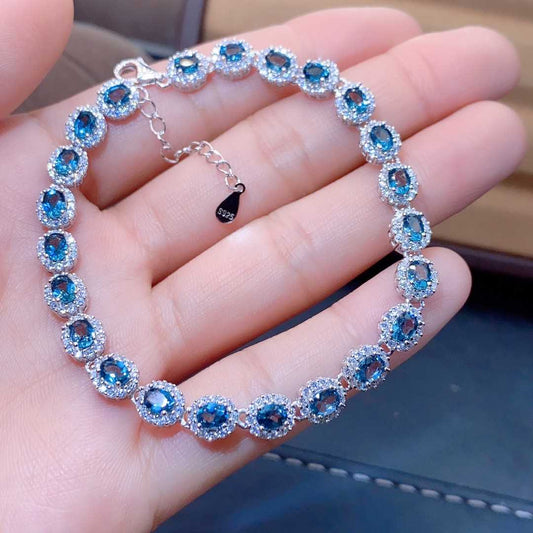 Blue Topaz Halo Tennis Bracelet | Sterling Silver