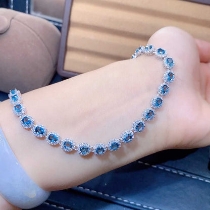Blue Topaz Halo Tennis Bracelet | Sterling Silver